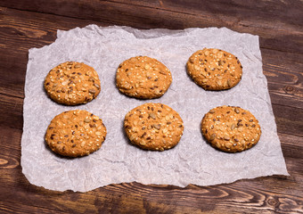 Useful cookies with flax, sesame, sunflower seeds and roasted oat grains. Homemade baking.