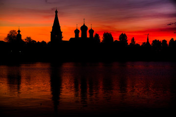 Fototapeta na wymiar Panorama of the Iversky Monastery in Valdai in Russia at sunset