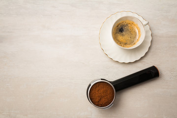 cup of coffee with filter holder