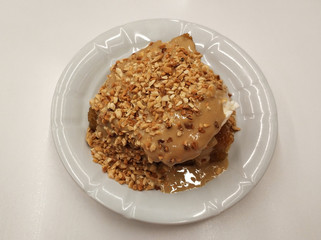 Turkish dessert ekmek kadayifi kaymak, bread pudding with butter cream