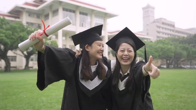 students taking picture on graduation day