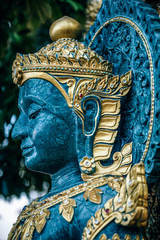 Fototapeta na wymiar Close-up Shot of the Face of a Buddhist Statue