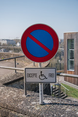 Car parking for people with disabilities. Disabled parking place.