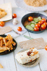 Roasted tofu - popular vegetarian cheese, in metal plate.