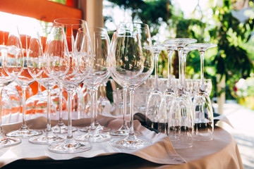glass for wine. many empty glasses on a picnic in nature