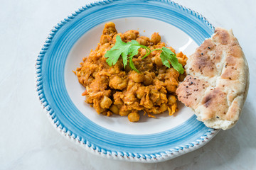 Chole or Chana Masala or Spicy Chickpeas is traditional North Indian main course recipe and usually served with Bhature or Roti/ Naan.