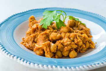 Chole or Chana Masala or Spicy Chickpeas is traditional North Indian main course recipe and usually served with Bhature or Roti/ Naan.