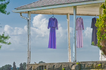 Amish Dresses Drying on Front Porch