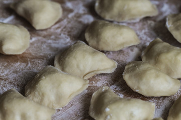 Vareniks. Slavic food. Ukrainian national dish. Traditional dish The process of preparing vareniks. Dough. Flour. Horizon