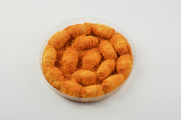 Turkish dessert kadayif, sweet food on white background