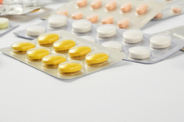 Group of multi colored pills, capsule with copy space on white background 