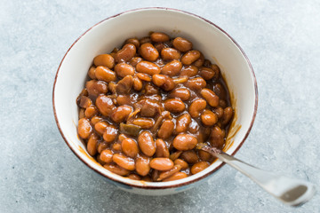 Homemade Barbecue Baked Beans in Porcelain Bowl.