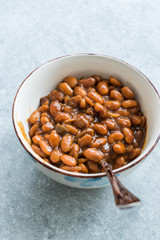 Homemade Barbecue Baked Beans in Porcelain Bowl.