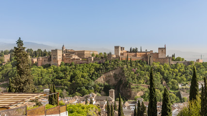 Fototapeta na wymiar Views of the Alhambra from the other side of the valley, in the Albaicín neighborhood in Granada, Spain