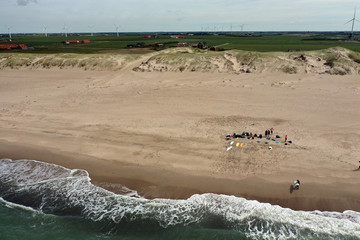 a group of surfboards from  a drone perspective 