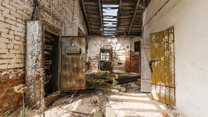 Fototapeta na wymiar Abandoned farm in Chernobyl exclusion in Belarus