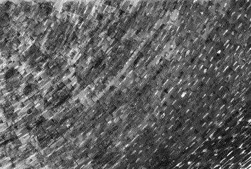 Abstract black and white background with brush strokes.