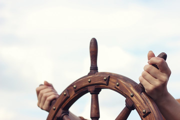 Steering hand wheel ship on sky background © alzay