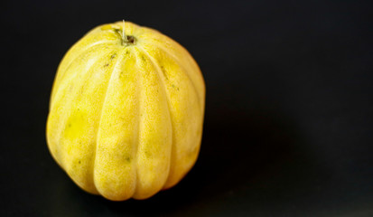 Cantaloupe or blewah on black background. 