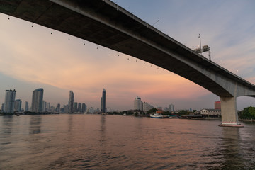 Rama3 bridge cross over Chao phraya river in evening Bangkok, Thailand. Cityscape Concept.