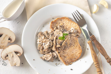 Portion of creamy garlic mushroom pork