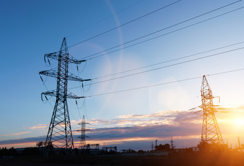 High power electricity poles in urban area. Energy supply, distribution of energy, transmitting...