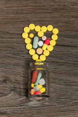 jar with heart shaped pills