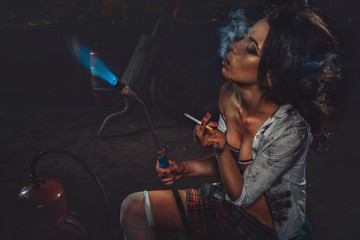 Smoking Girl with blowpipe