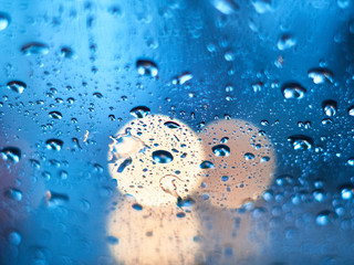 Abstract water droplet on window with selective focus