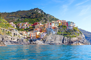 Manarola, Liguria, Italy fisherman village, colorful houses on sunny warm day. Monterosso al Mare,...