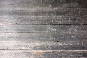 Dark shabby wooden planks texture. Top view