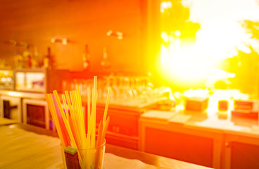 Sun coming into the bar  in a club In the morning, nobody is around.