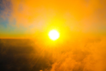 Naklejka premium Golden light in Forested and mountain with sunrise in morning mist.Fog cover the jungle hill in Thailand