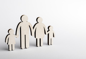 Family concept. Wooden figures.