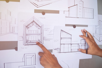 Architect Designer Engineer sketching drawing draft working Perspective Sketch  design house construction Project