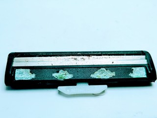 Used razor blade on white background