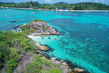 Fototapeta premium Aerial drone view of amazing tropical paradise Koh Kra island with white empty beach during sunny summer day, Thailand