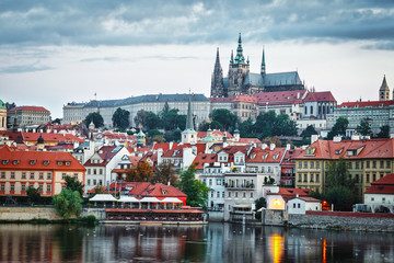 Fototapeta premium Evening in Prague. View of Prague Castle and the Vltava River Embankment. Czech Republic.