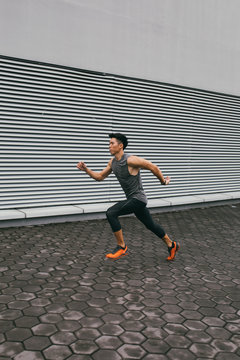Asian Man Running with Motion Blur
