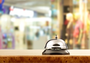 Vintage hotel reception service desk bell.