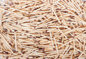 Heap of wooden matches with a sulfur head for texture