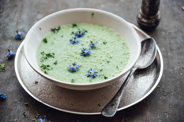Food: Fresh cold cucumber soup with borage blossoms and cress