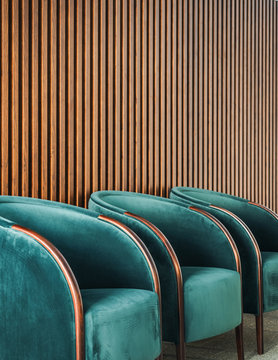 Row of comfortable armchairs in waiting zone