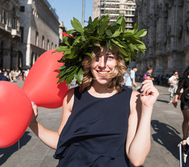Happy young woman celebrating graduation