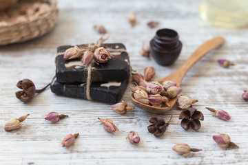 handmade soap with roses on a white background. SPA concept.