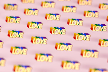 Closeup shot on Golden LOVE word with rainbow outline pattern. June as a month of gay pride and love concept. Isolated on pink background. 3D rendering
