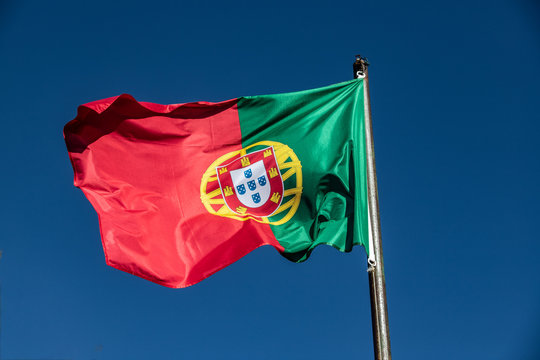 flag og portugal in blue sky