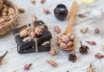 handmade soap with roses on a white background. SPA concept.