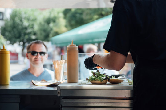 Food: Burger Being Prepared At A Food Truck