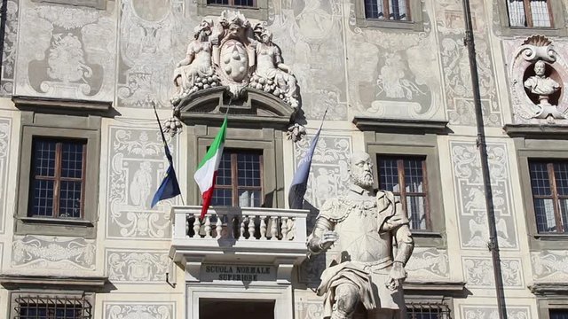 Detail of the Palazzo della Carovana, with the statue of Cosimo I. in Piazza dei Cavalieri in Pisa